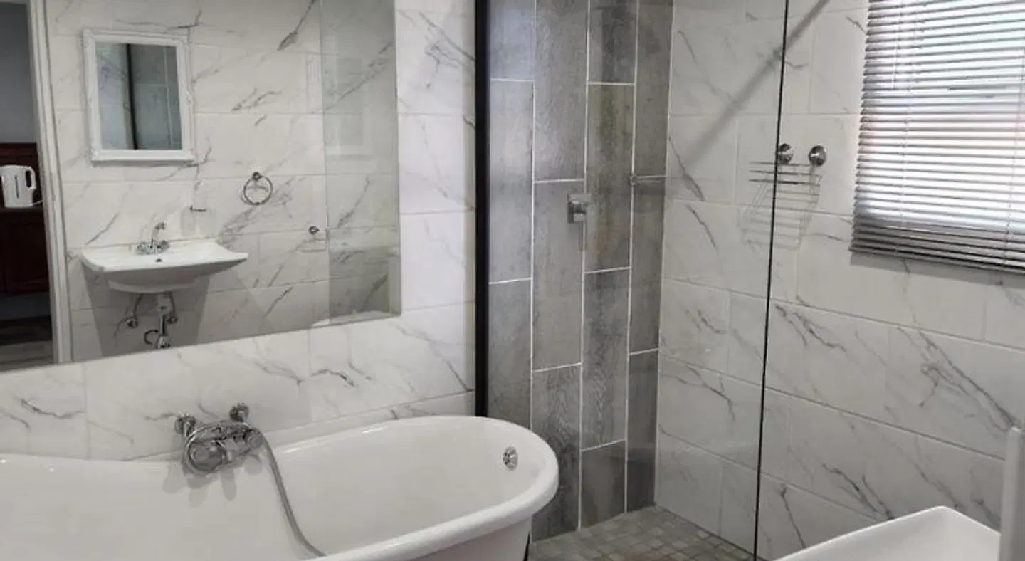 Graceland Guest House Badezimmer