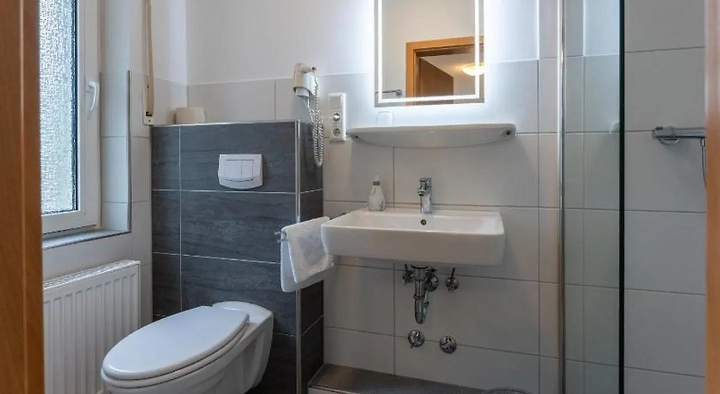 Rixbecker Alpen - Hotel Koch Badezimmer