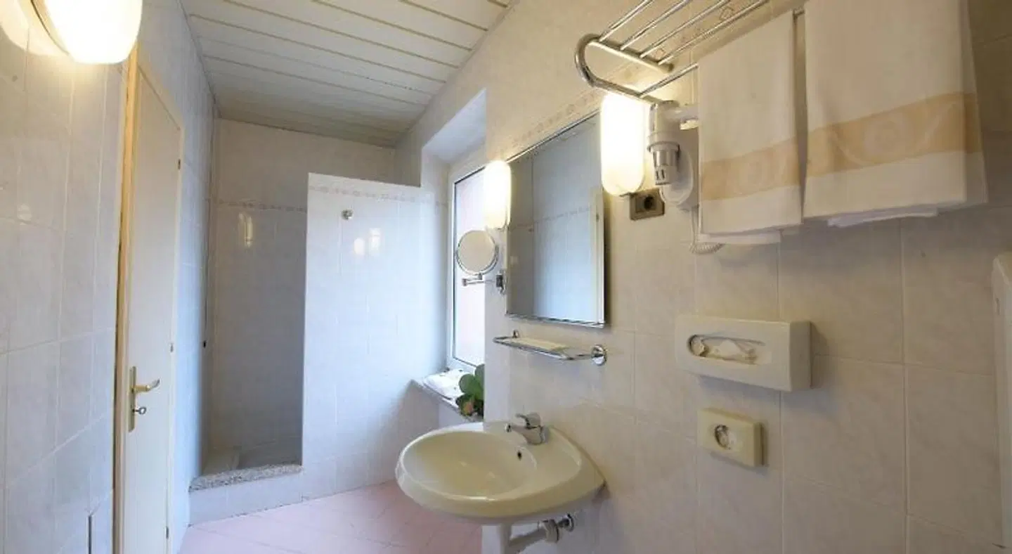 Button Badezimmer