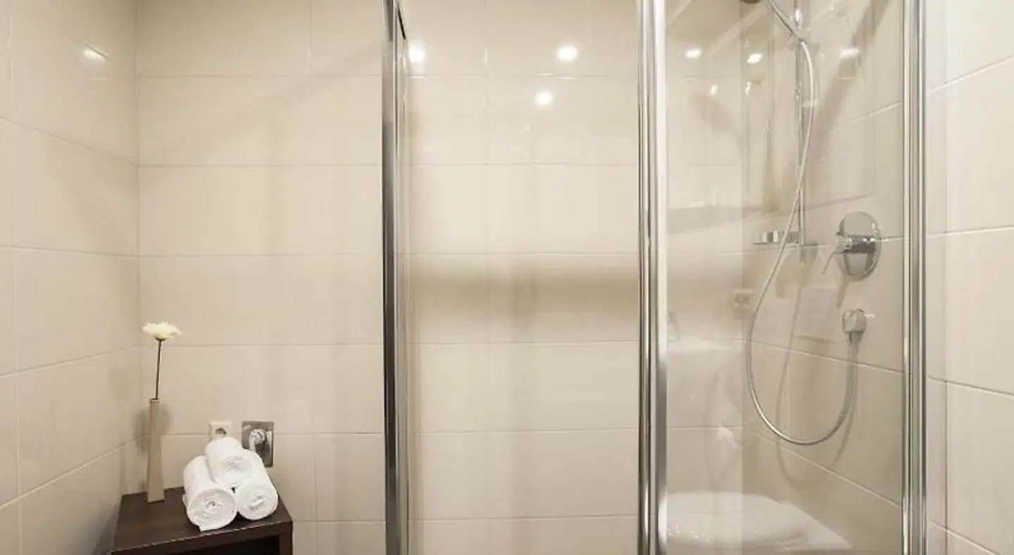 Aparthotel DeLuxe Badezimmer
