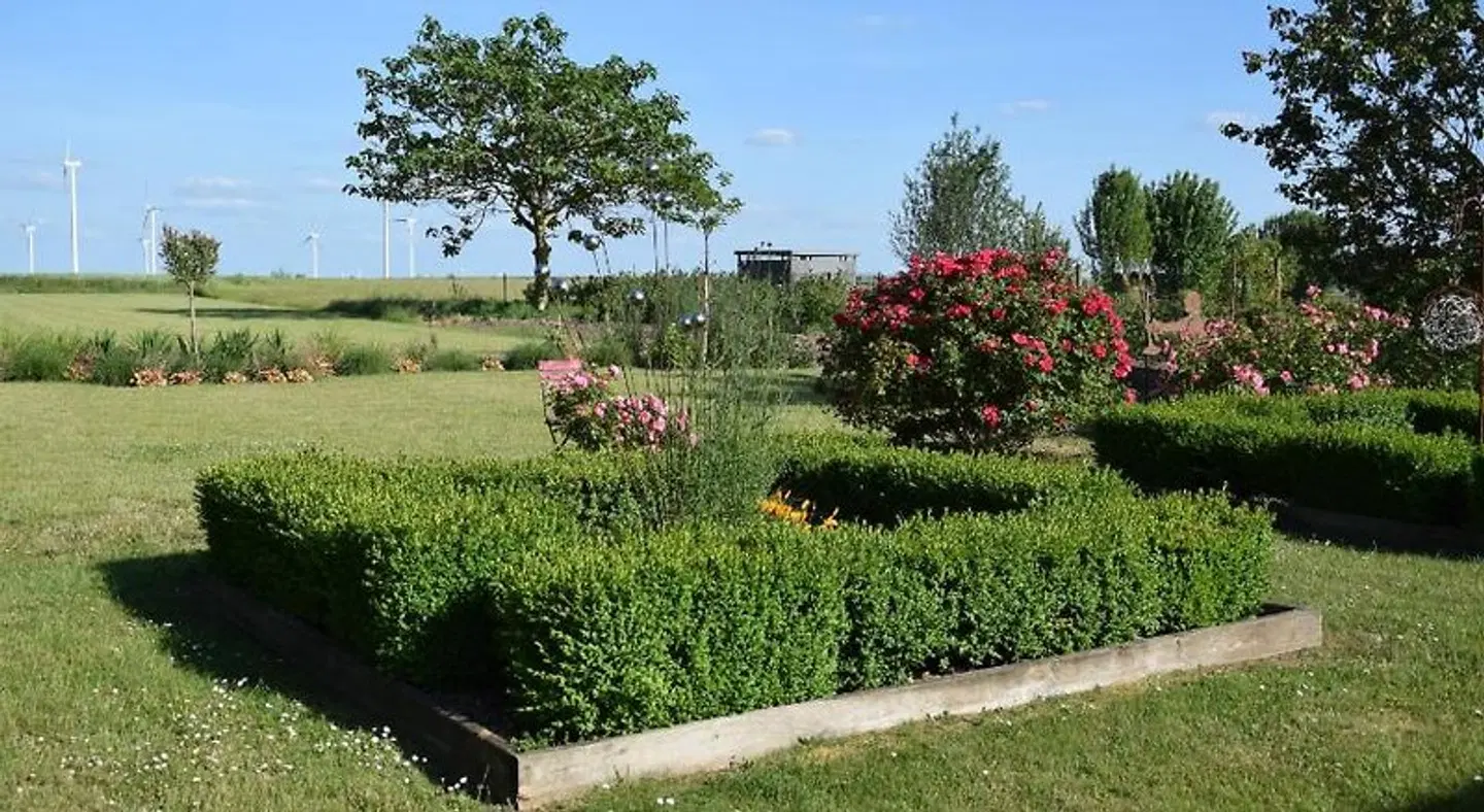 L'escale Aux Framboises Garten