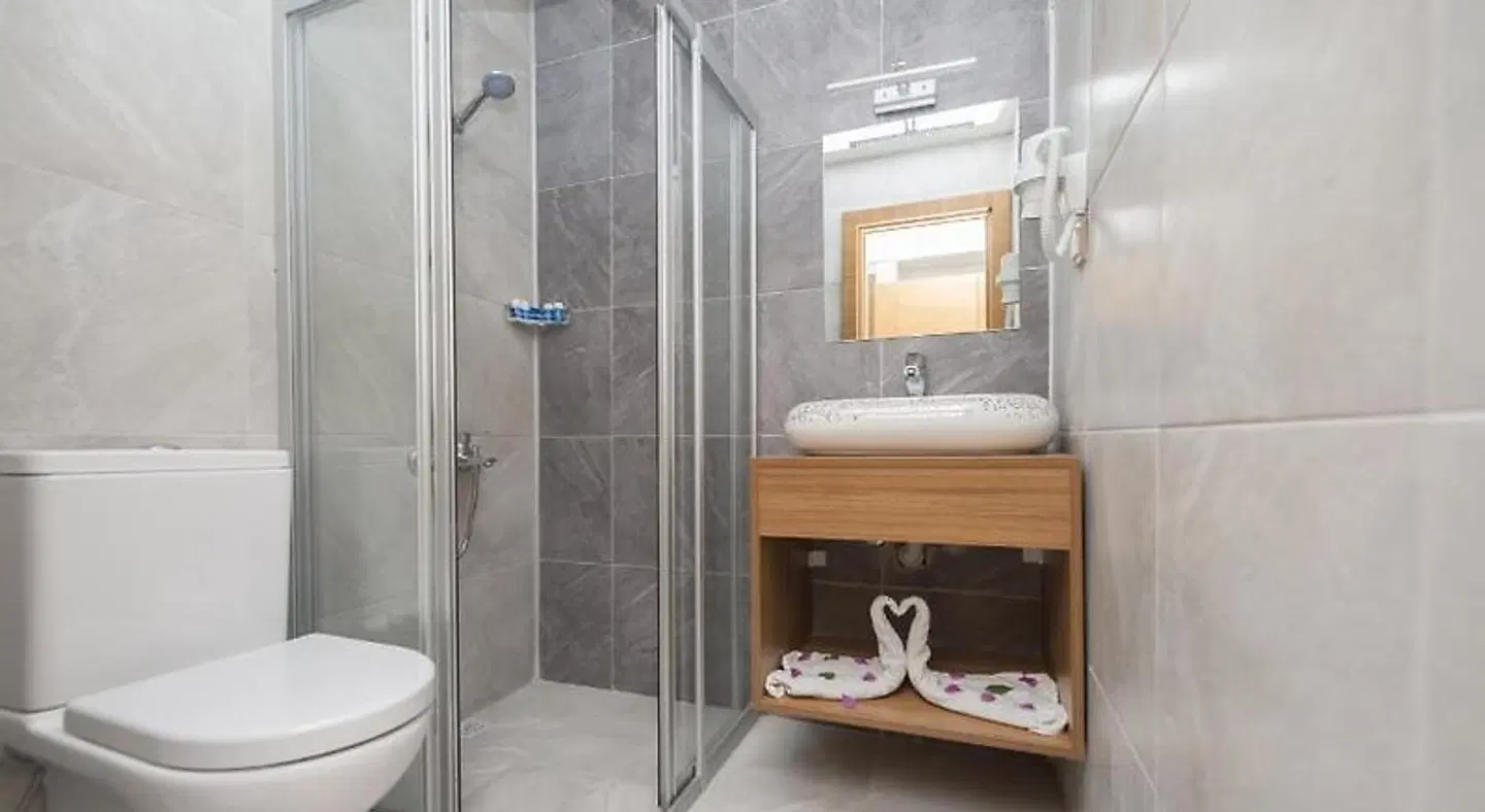 Amore Hotel Teki'rova Badezimmer
