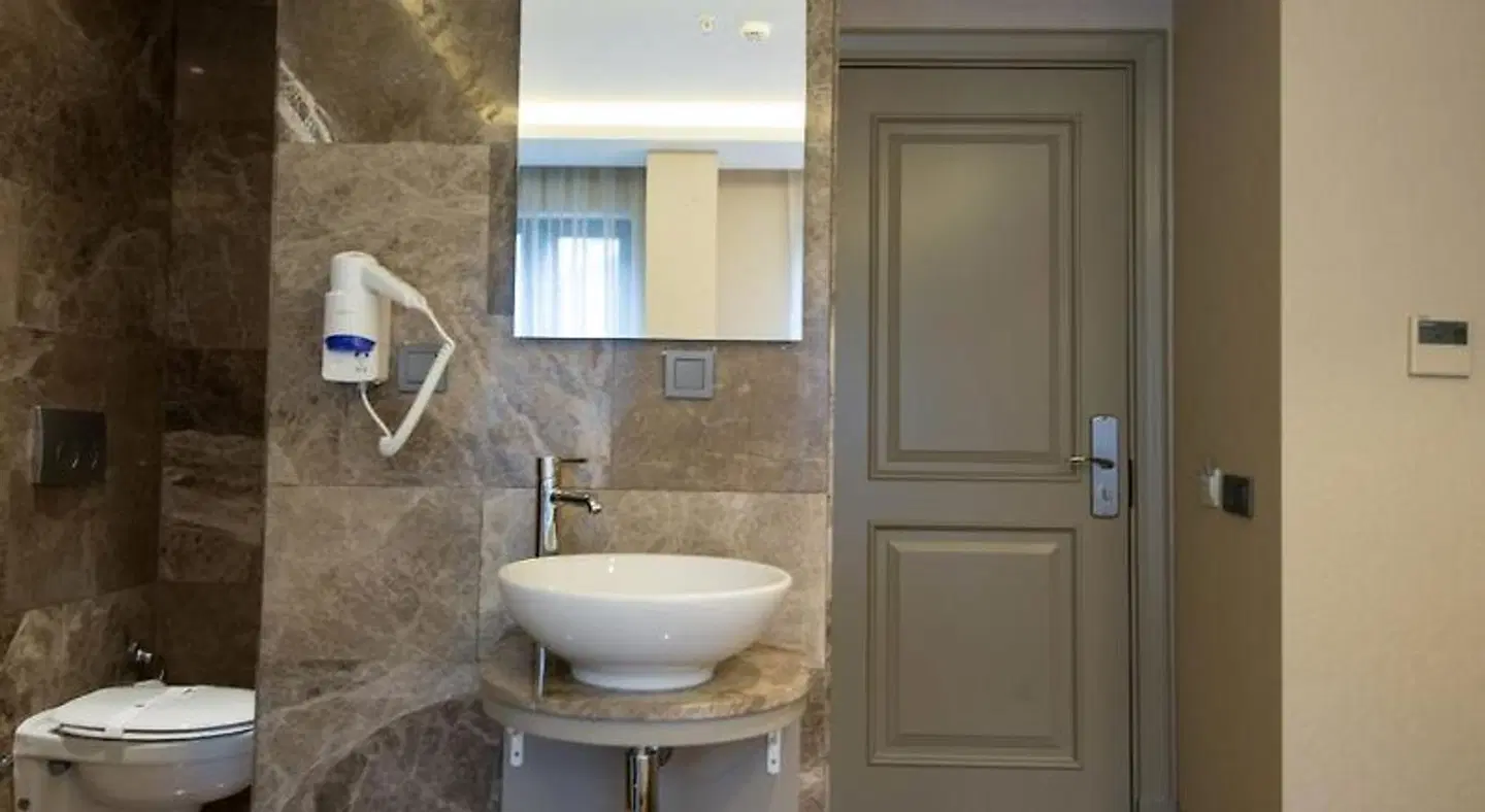 GK Regency Suites Badezimmer