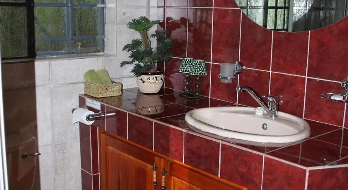 Tatenda Guest House Badezimmer