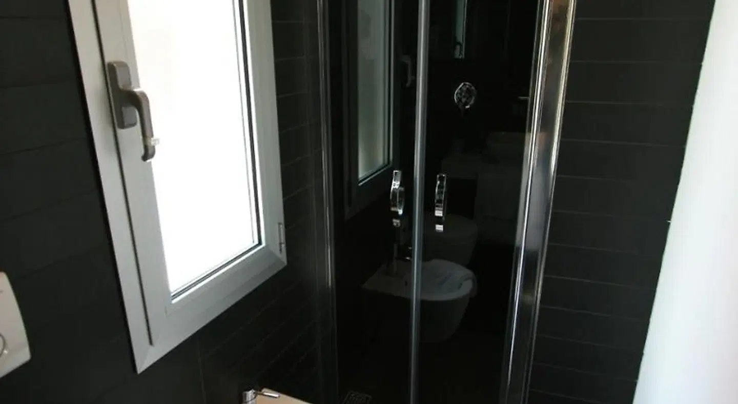Q Hotel Badezimmer