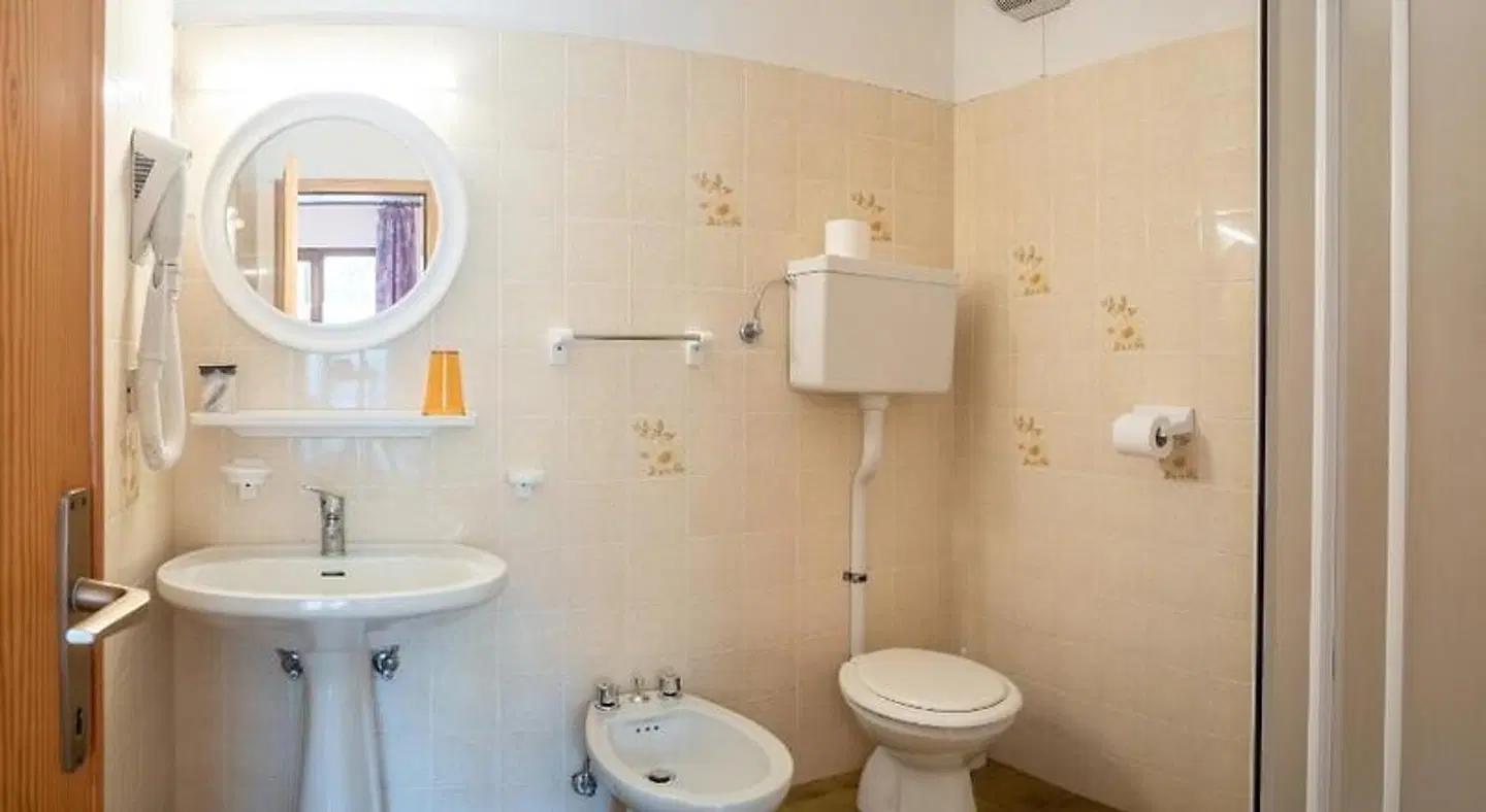 Hotel Piccola Baita Badezimmer