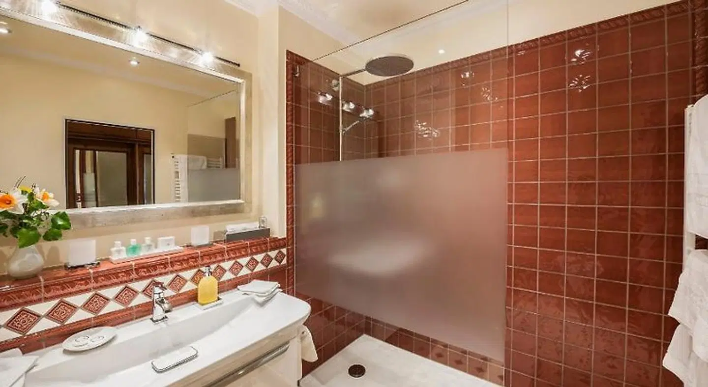 Relais & Châteaux Hotel Schwarzmatt Badezimmer