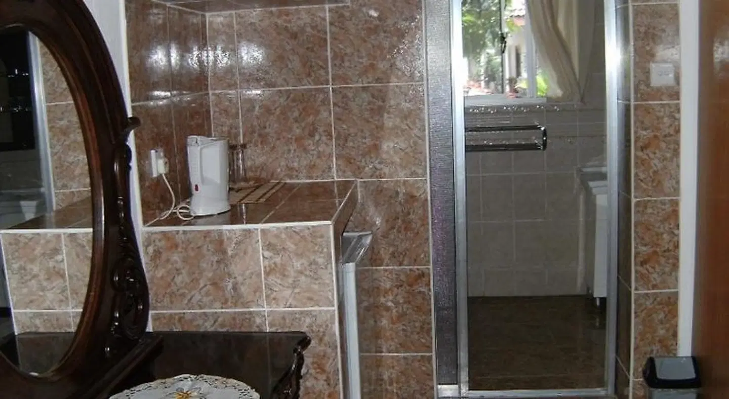 Rising Sun Guesthouse Badezimmer
