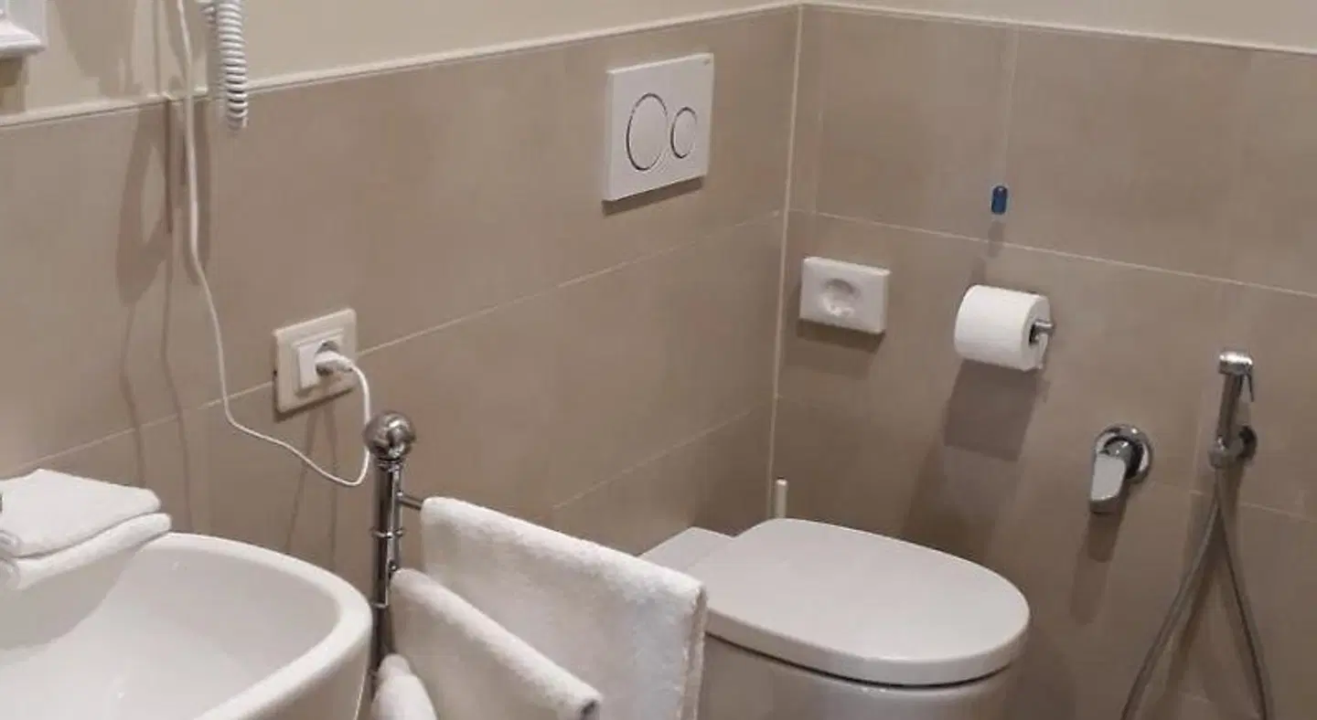 LE SETTE VIE HOLIDAY HOMES Badezimmer