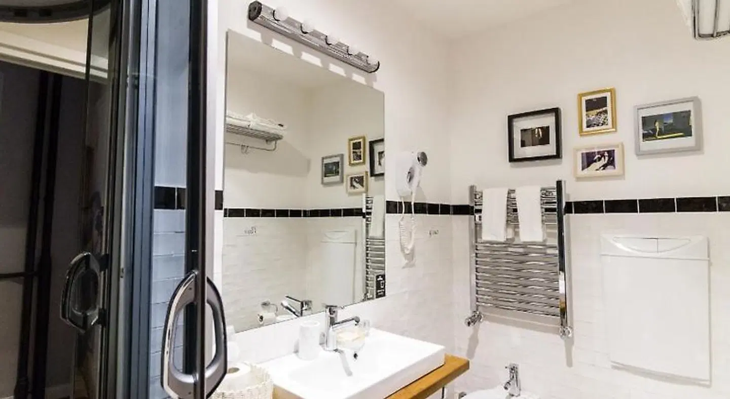 Athena Guest House Badezimmer