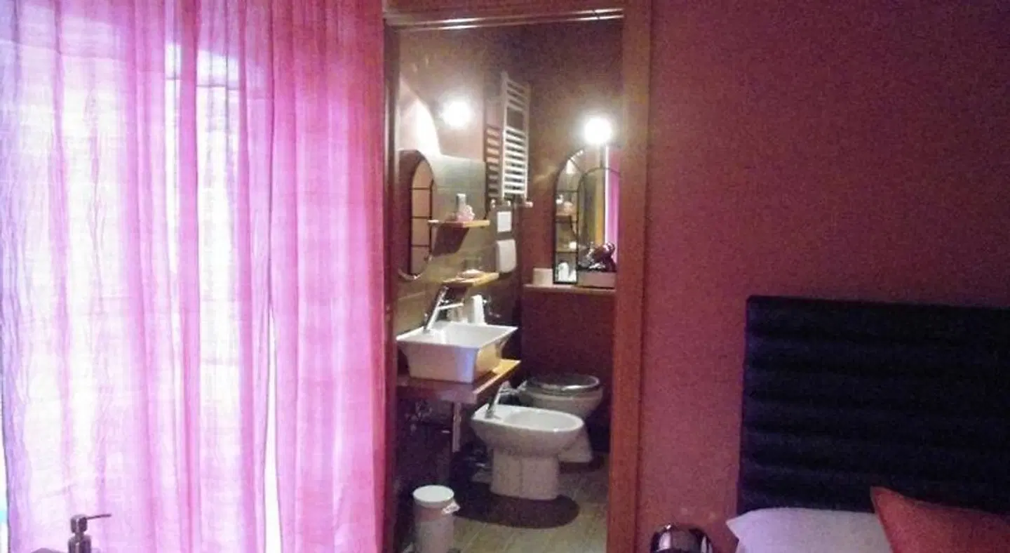 Aida Charming Rooms Badezimmer