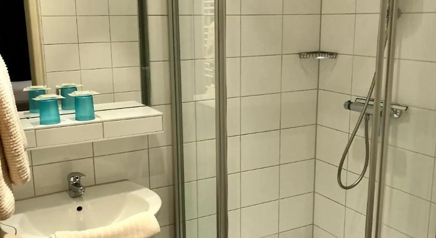 Hotel am Bahnhof Badezimmer