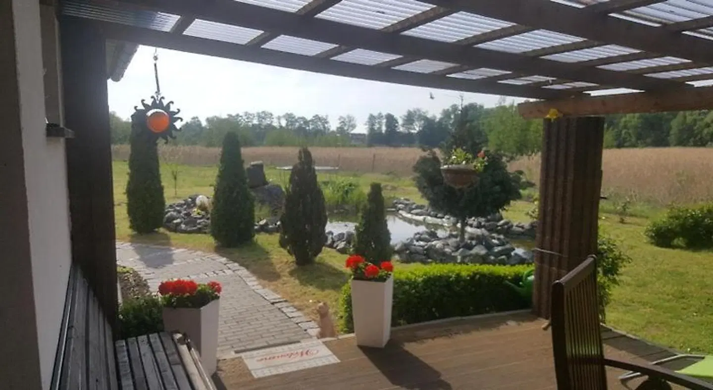 Ferienhaus am Teich Garten