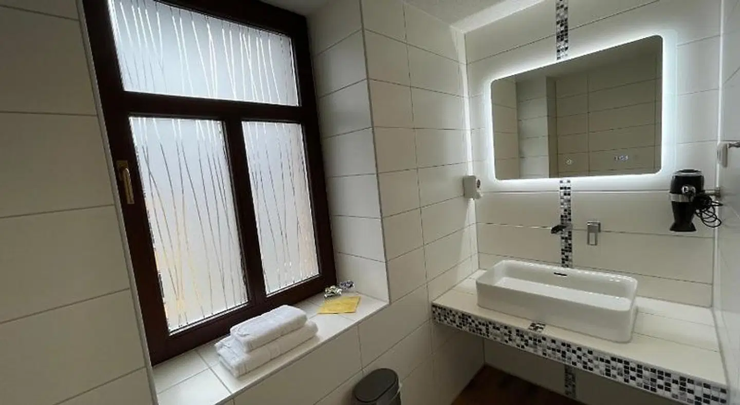 Avenue Das Gästehaus Badezimmer