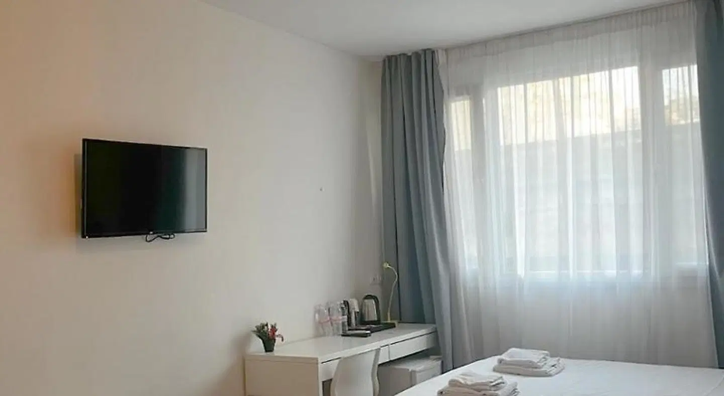City Plaza Apartments & Rooms ROOM_EXAMPLE