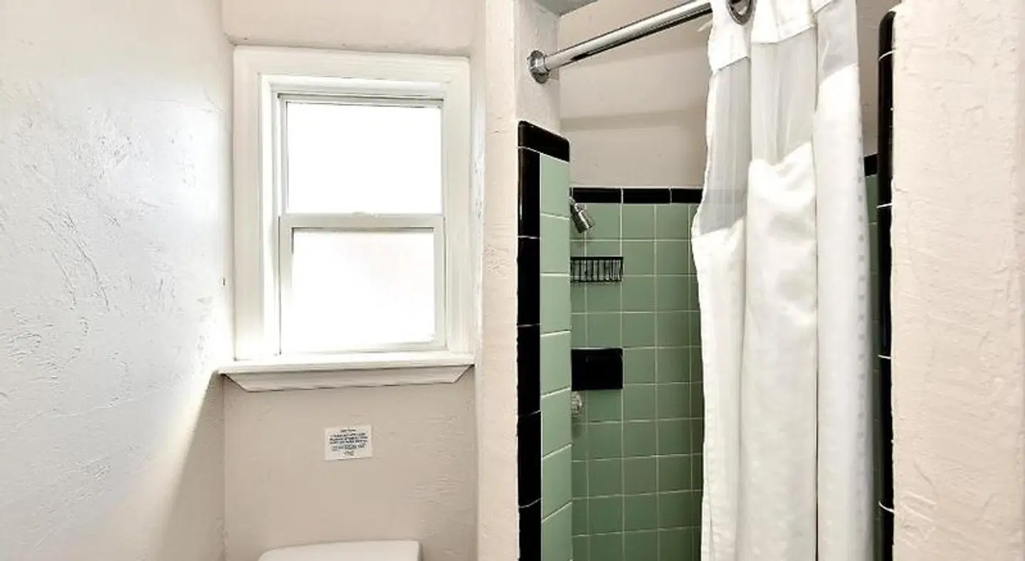 Shoreline All Suites Inn & Cabana Colony Cottages Badezimmer