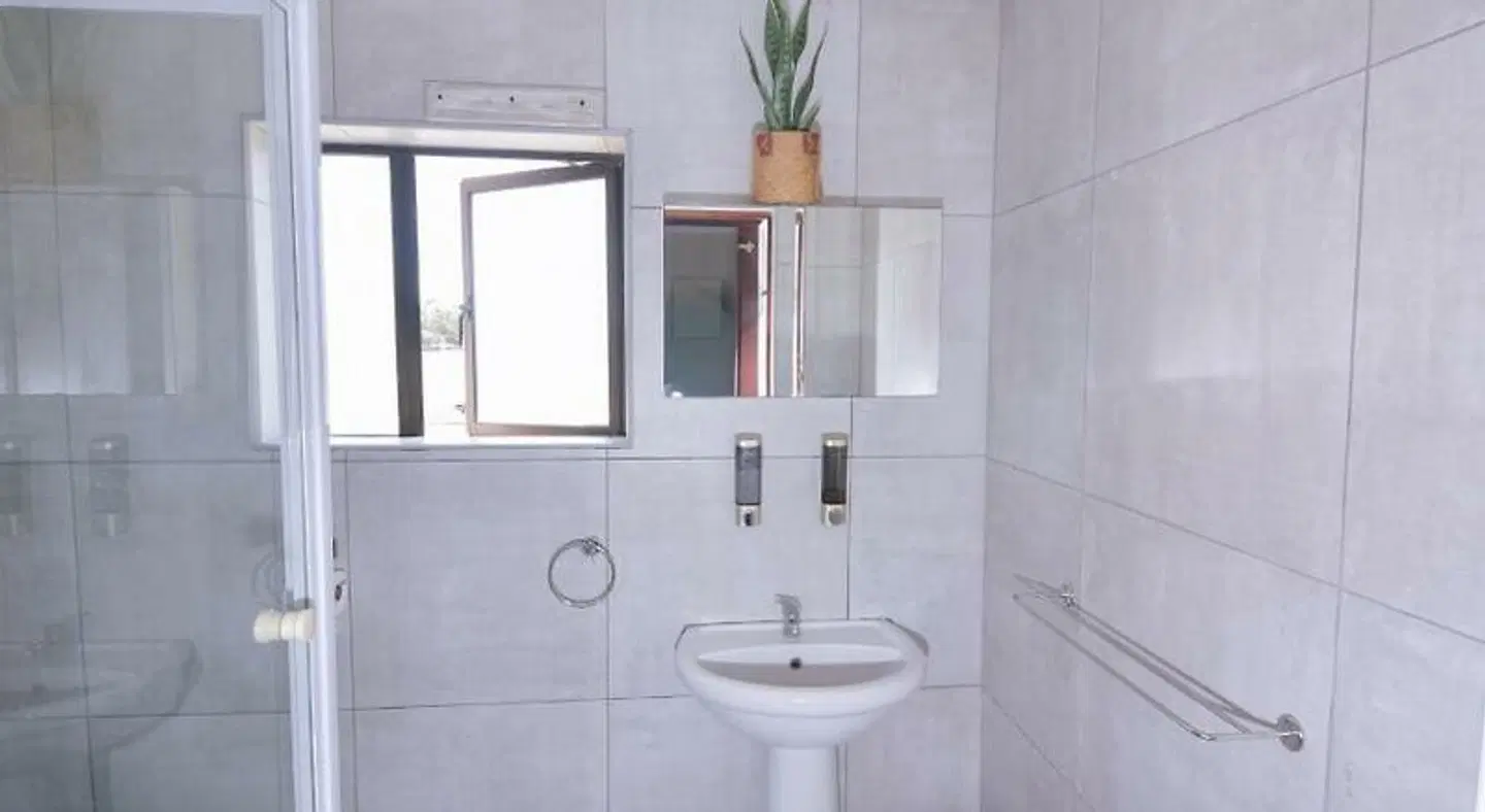 Royal Palms Guest House Badezimmer