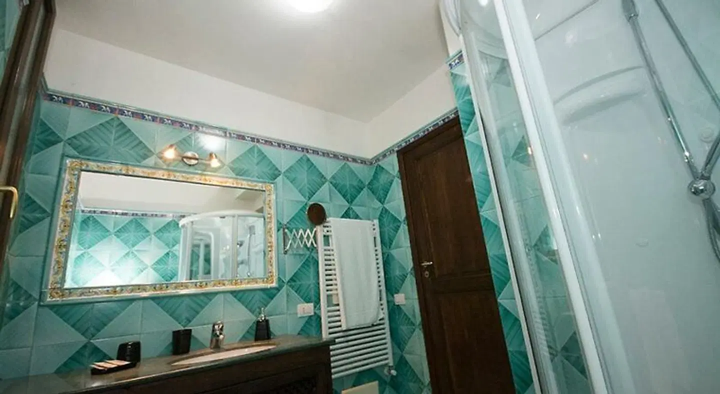Cala D'Aspide Resort Badezimmer