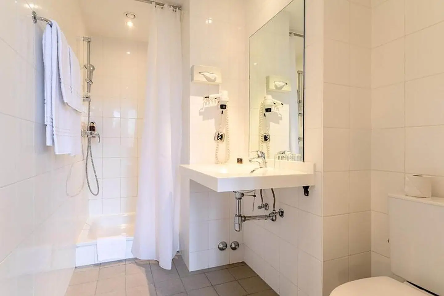 Hotel Alma Grand Place Badezimmer