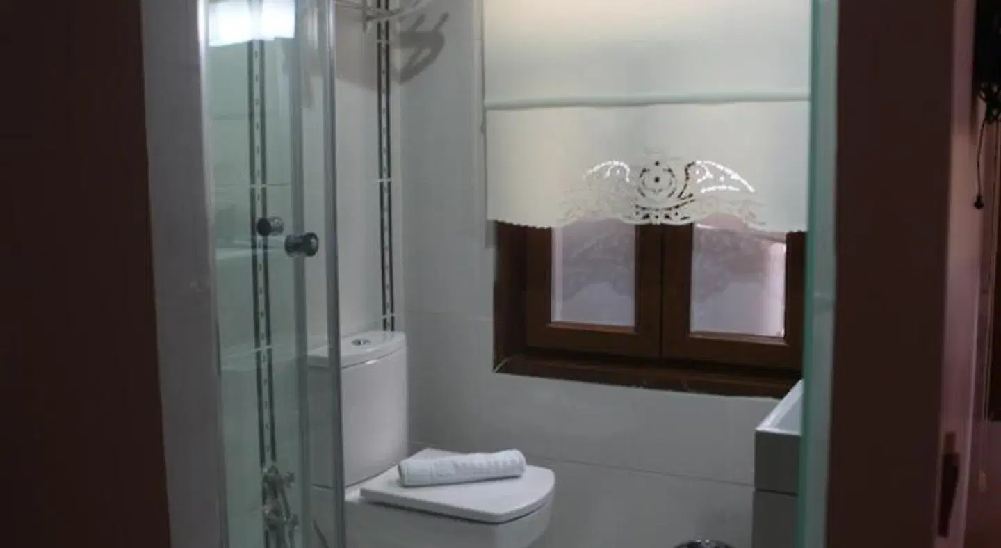 Tom Square Boutique Hotel Badezimmer