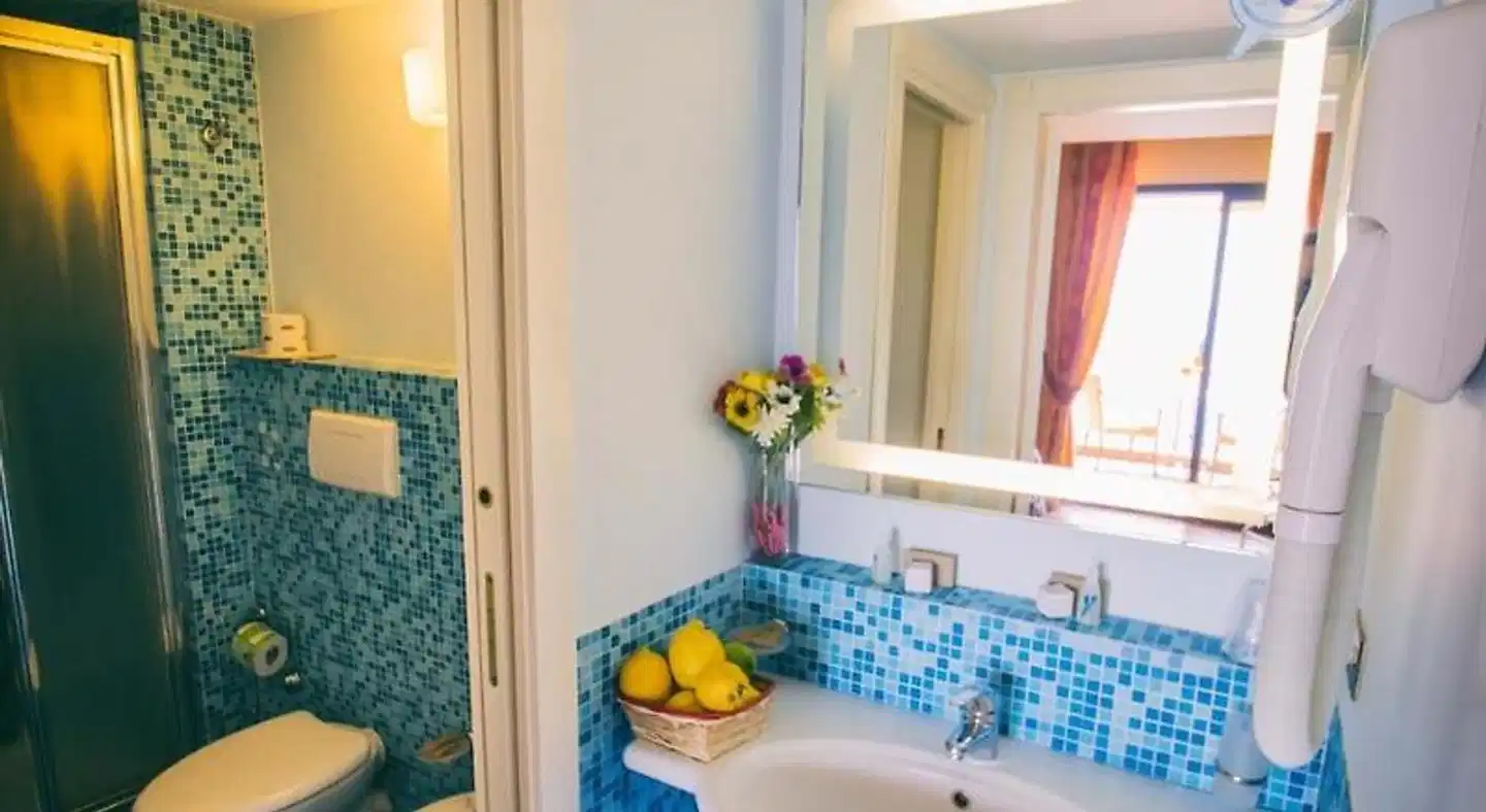 Capo dei Greci Taormina Coast- Resort Hotel & SPA Badezimmer