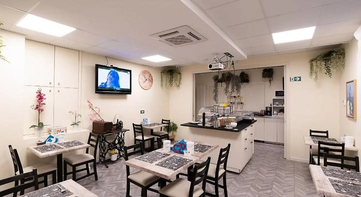 Rooms Boutique Carducci Restaurant