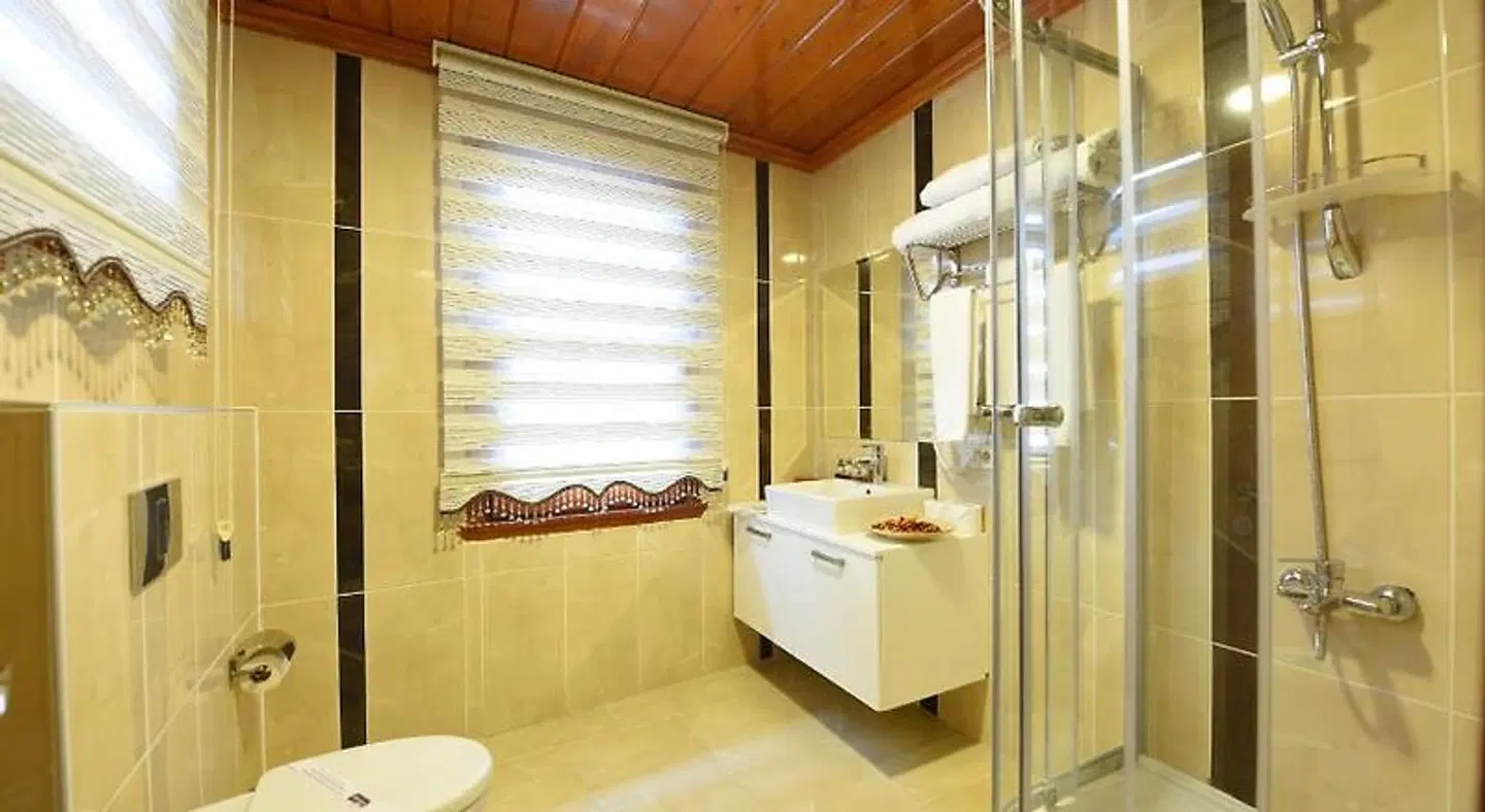 Elyka Hotel Badezimmer