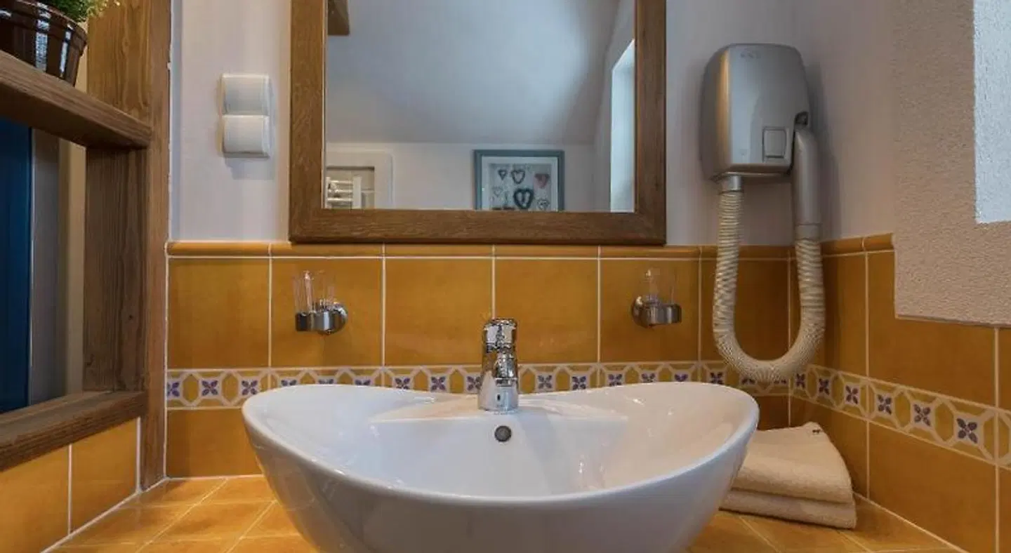 Aparthotel Bambi Badezimmer