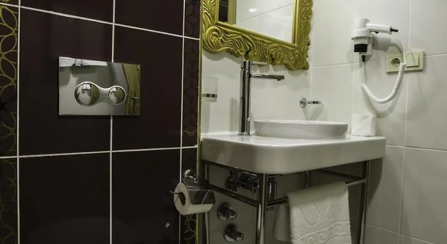 Empire Suite Hotel Badezimmer
