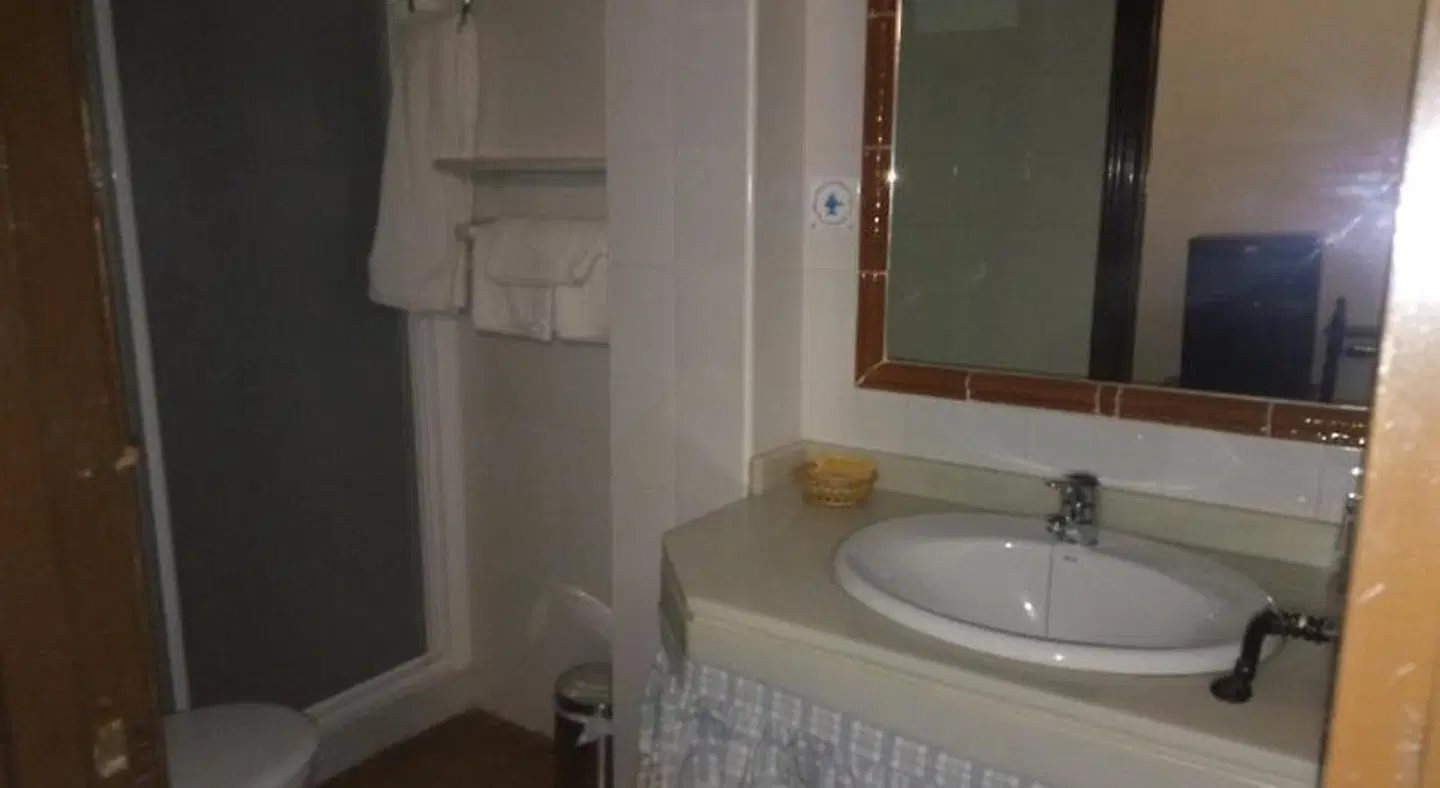 Hostal Gran Capitan Badezimmer