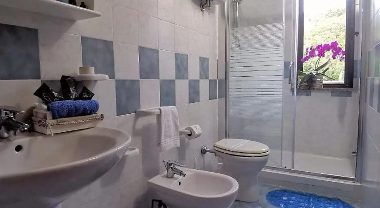 Baciati dal Sole Badezimmer