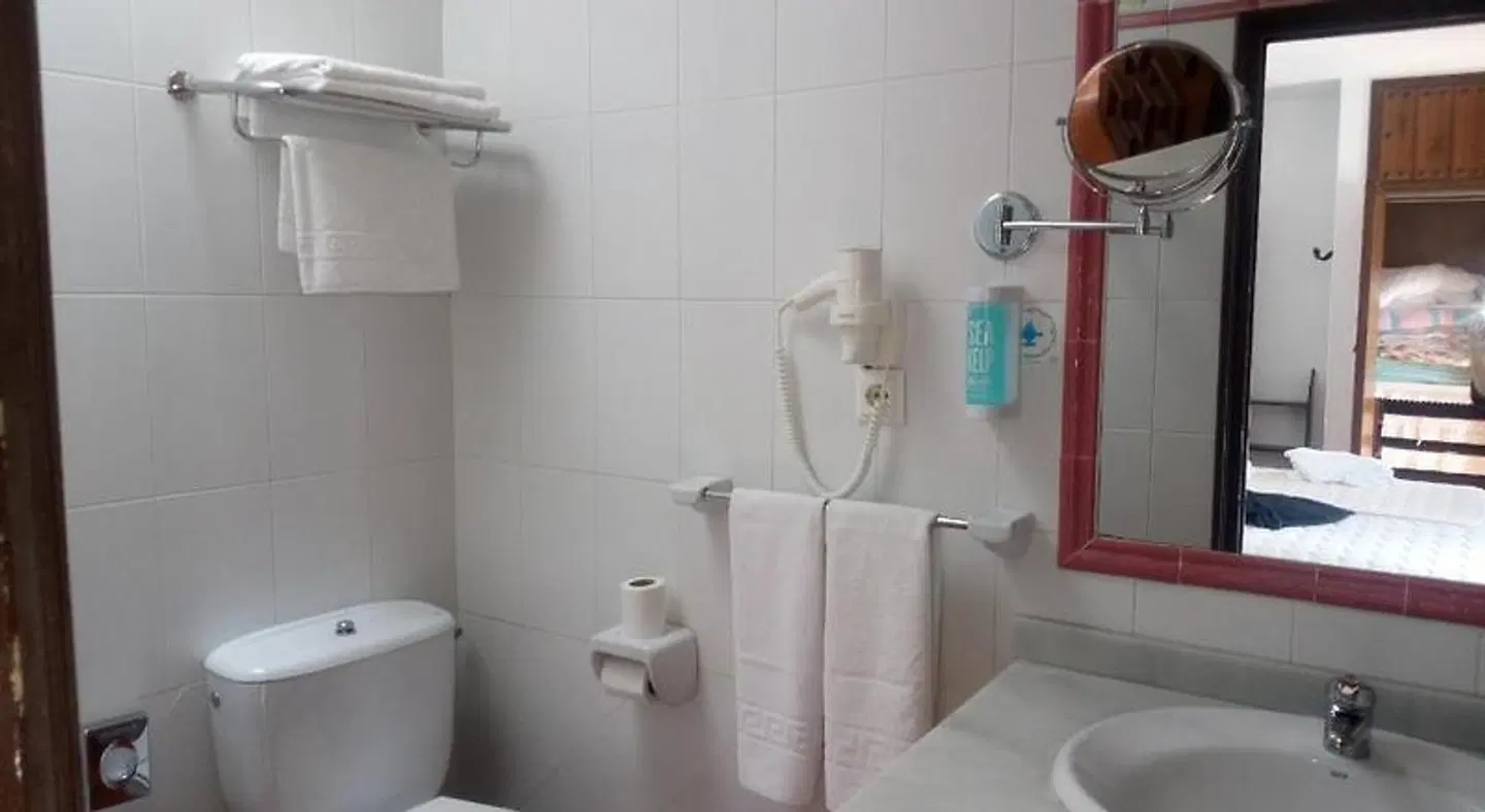 Hostal Gran Capitan Badezimmer