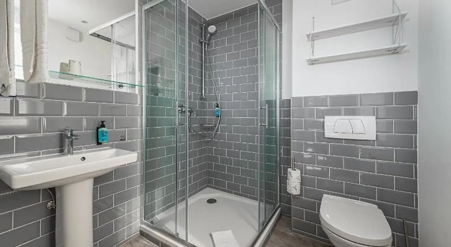 Hotel das Q Badezimmer