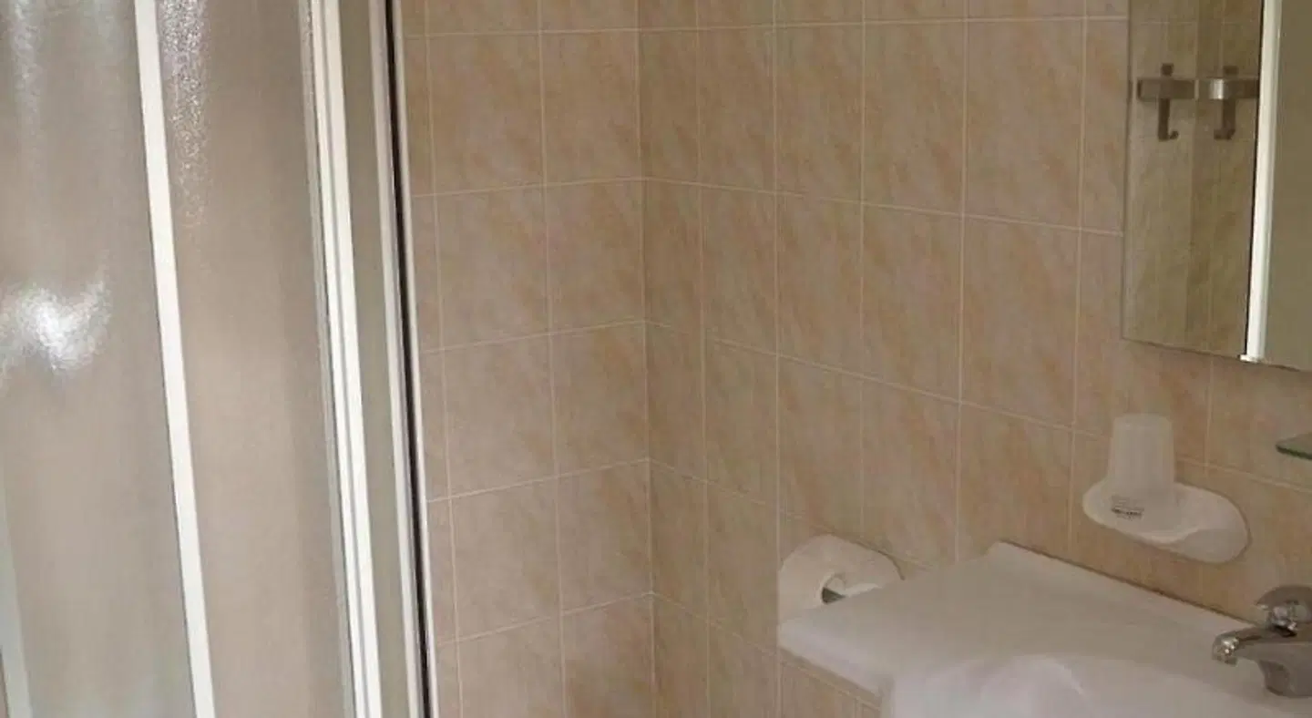 Hotel Arlecchino Badezimmer