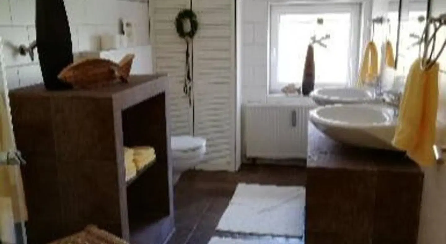 Land & Stil Badezimmer