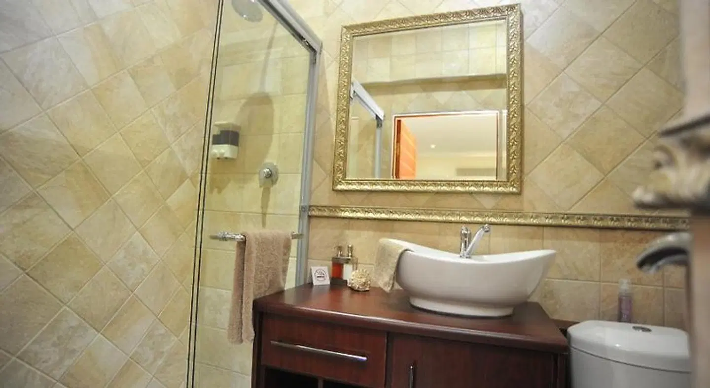 Sunset Manor Guest House Badezimmer