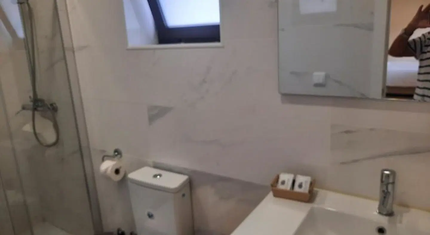 Metro Vilar Suites & Villas Badezimmer