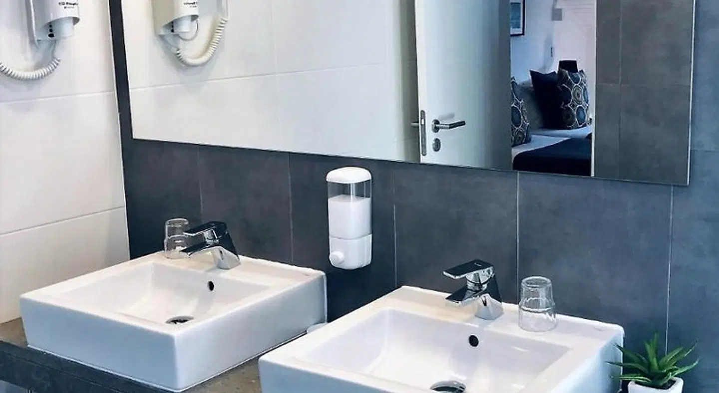 Hotel Botanico de Coimbra Badezimmer