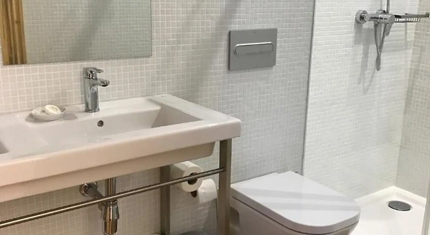 Casa da Praça Square Suites Badezimmer
