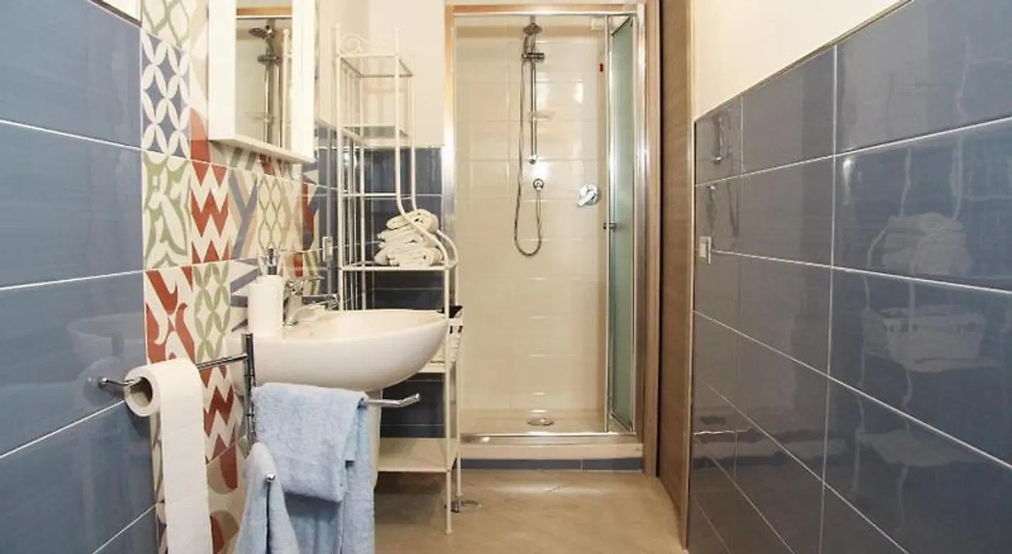 Benvenuti al Sud Badezimmer