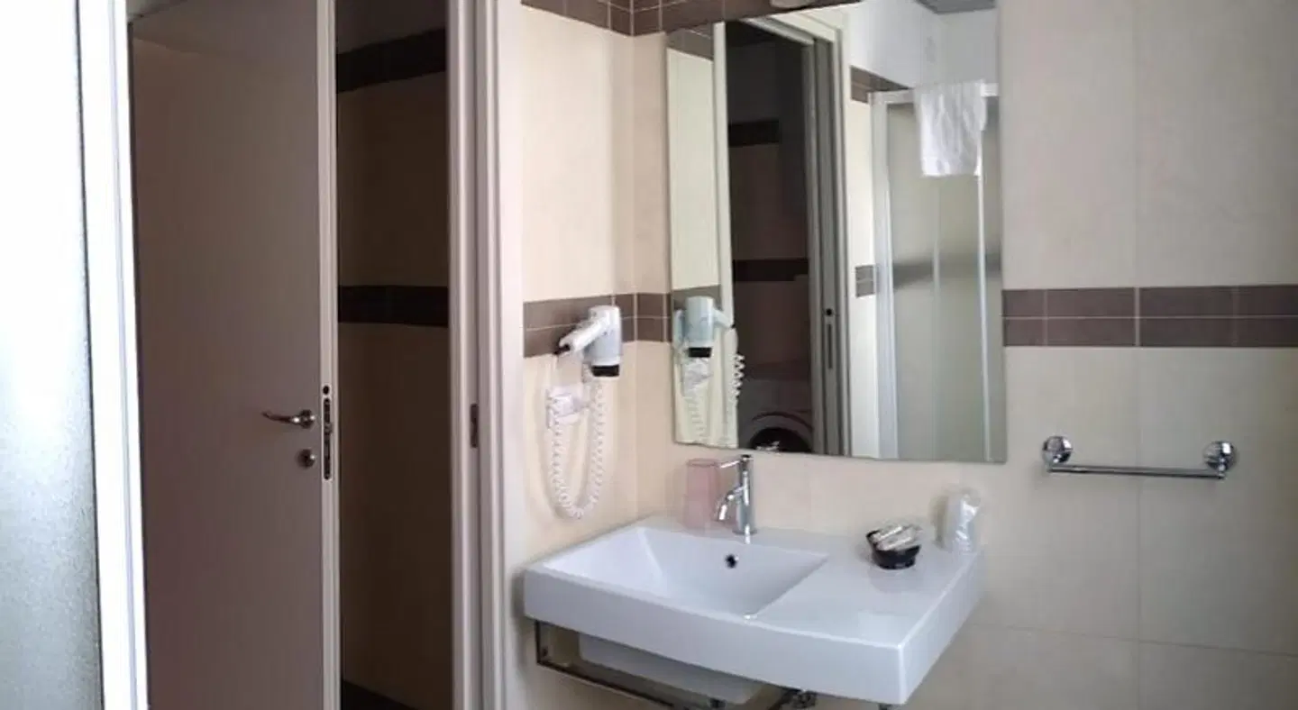 Residence Ilario Suite Hotel Badezimmer