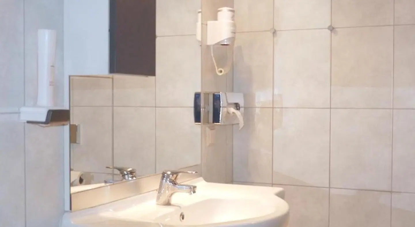 Das Reinisch Just Rooms Badezimmer
