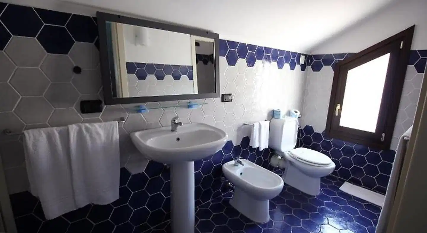 Hotel Capo Campolato Badezimmer