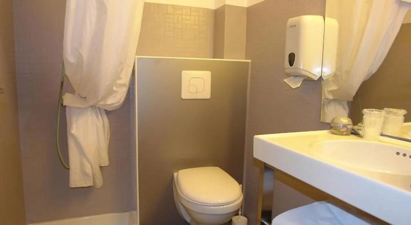 Régina Boutique Hotel Badezimmer