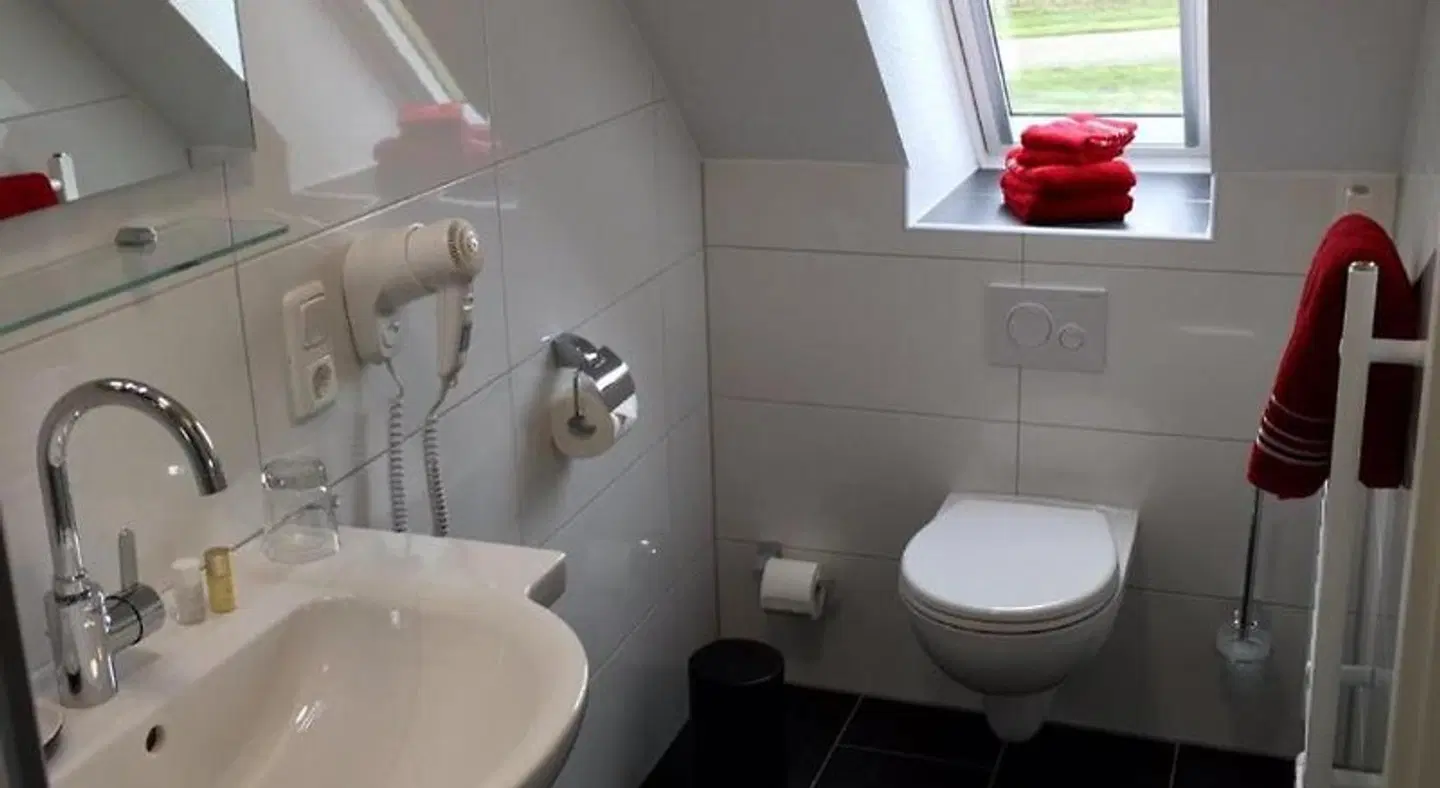 Hotel Garni HaWattn Badezimmer