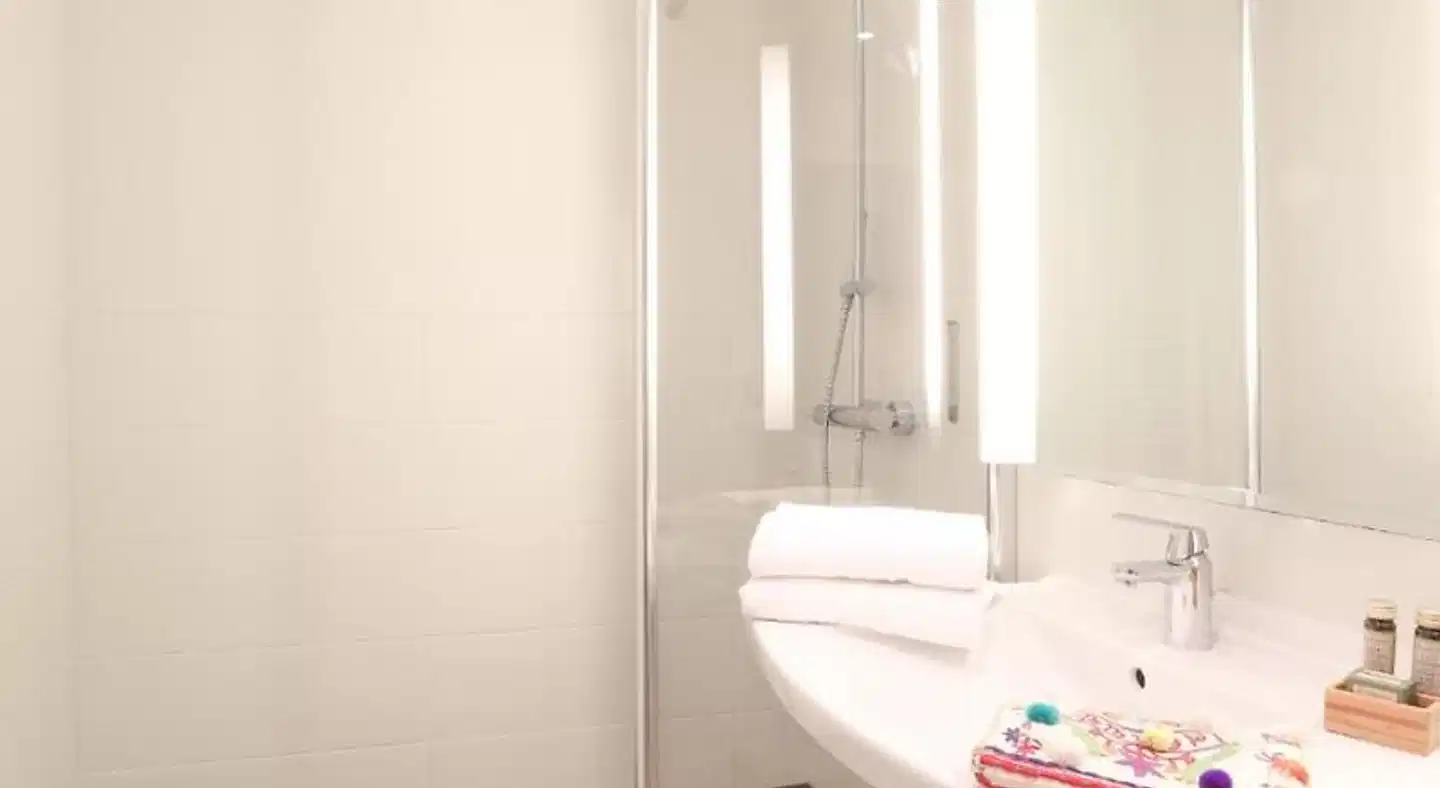 Hôtel le Donjon Badezimmer