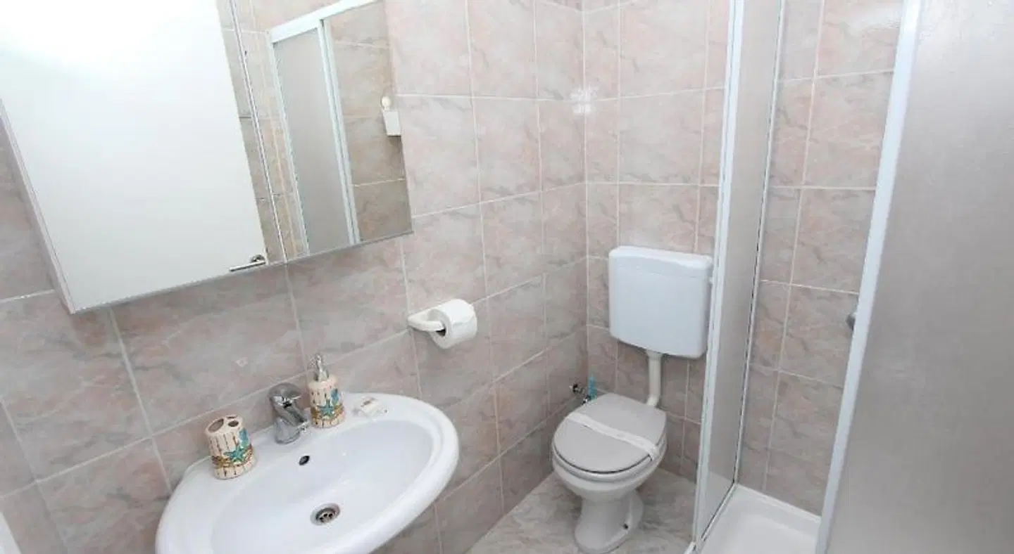 Ambienti Guest House Badezimmer