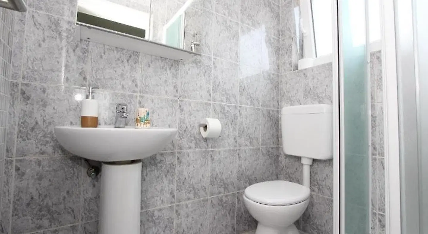 Ambienti Guest House Badezimmer