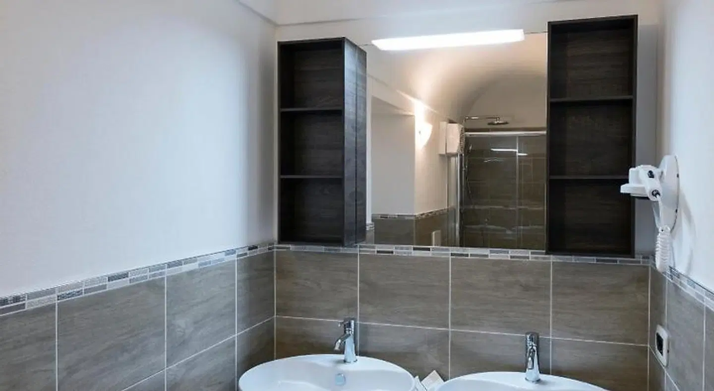 Hotel Garni Corona Badezimmer