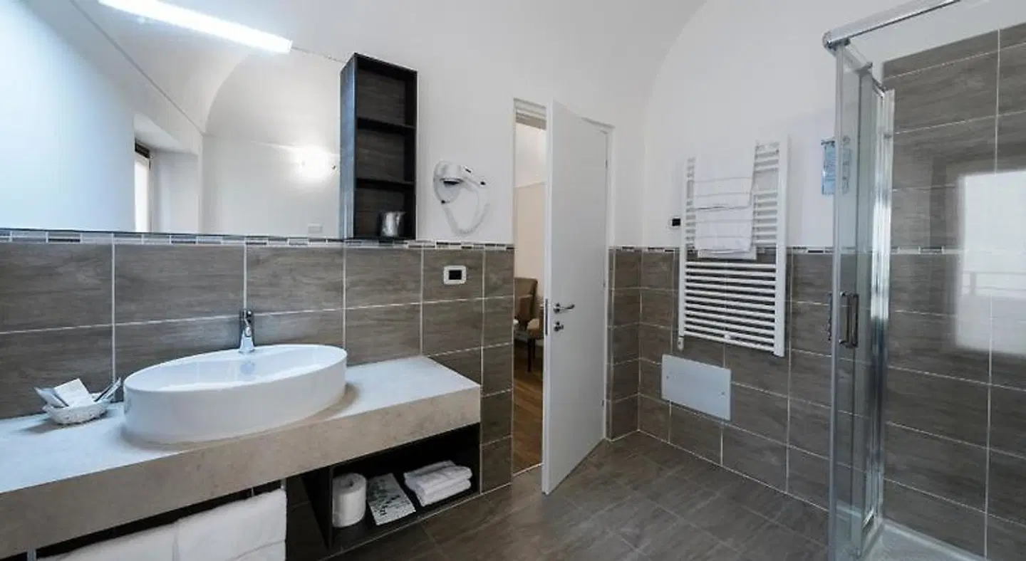 Hotel Garni Corona Badezimmer